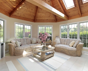 6738157 - sunroom with wood beams in luxury suburban home